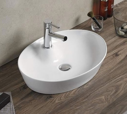 Раковина из сантехнического фаянса CeramaLux 9436 60х40 накладная цвет белый 1 отверстие под смеситель